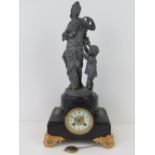 A Japy Frères polished slate mantel clock surmounted by a spelter figurine of woman and infant in
