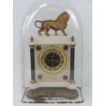 A late 19th century Continental white marble mantle clock having enamelled and glazed chaper ring