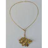 A Danish silver and 24ct gold leaf pendant and necklace by Flora Danica of Copenhagen,