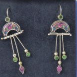 A pair of silver earrings,
