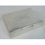 A HM silver cigarette box, London 1974 - S J Rose & Son, with good cedarwood interior, 14 x 10 x3.