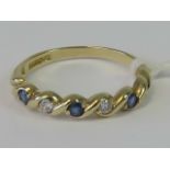 A 9ct gold sapphire and white stone ring,