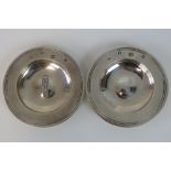 A pair of HM silver Armada dishes each measuring 11.