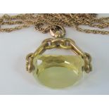 A Victorian 9ct gold citrine fob necklace, hallmarked with makers mark for John Grinsell & Sons,