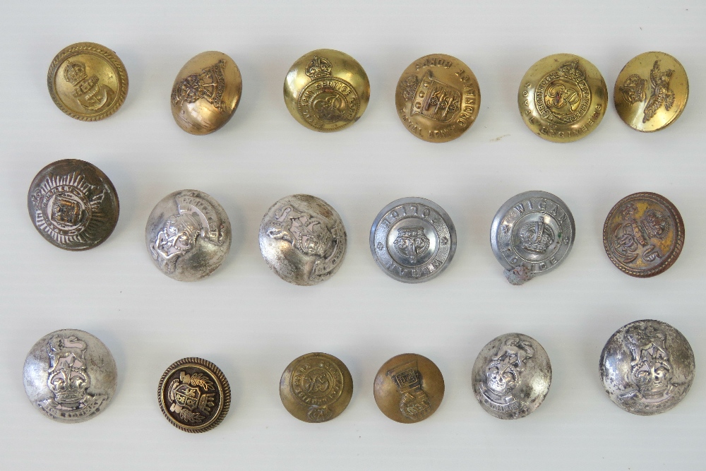 Eighteen assorted brass and nickel milit