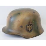 A WWII German helmet with double decal,