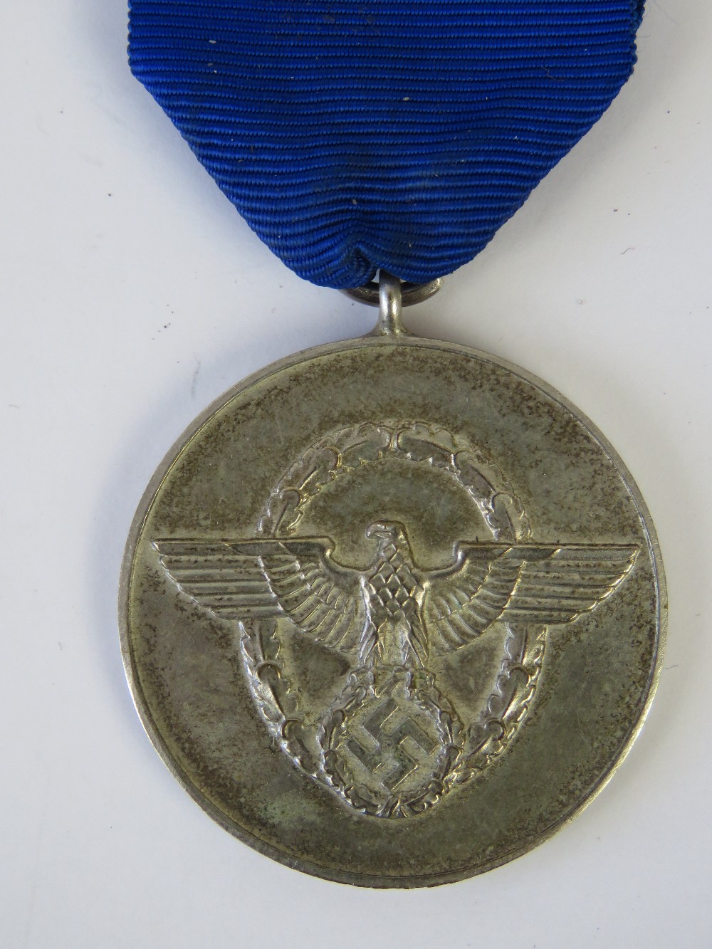 A WWII German Police 8year medal.