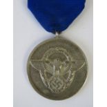 A WWII German Police 8year medal.