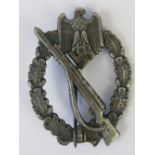 A WWII German Infantry Assault badge.