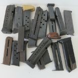 Twenty mixed pistol magazines.