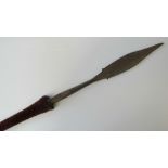 A vintage Nagaland spear with hair and t