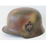 A WWII German helmet with double decal,