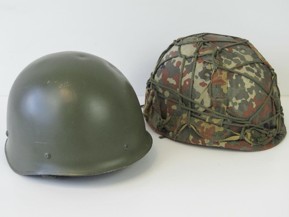 Two contemporary military helmets from t