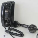 Two plasticised telephone receiver hands