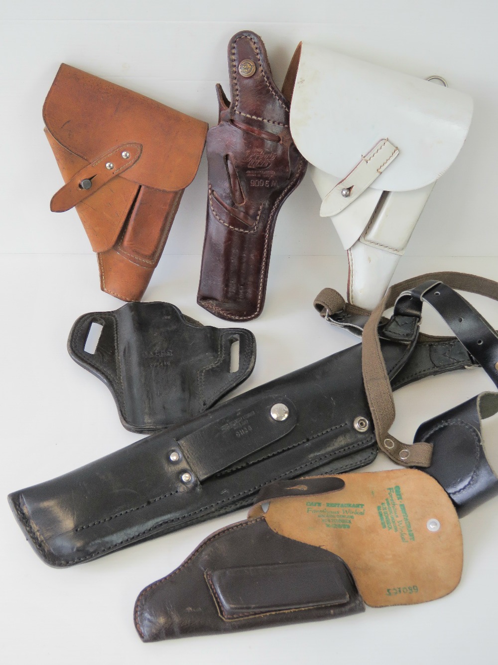 A selection of pistol holsters including