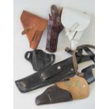 A selection of pistol holsters including