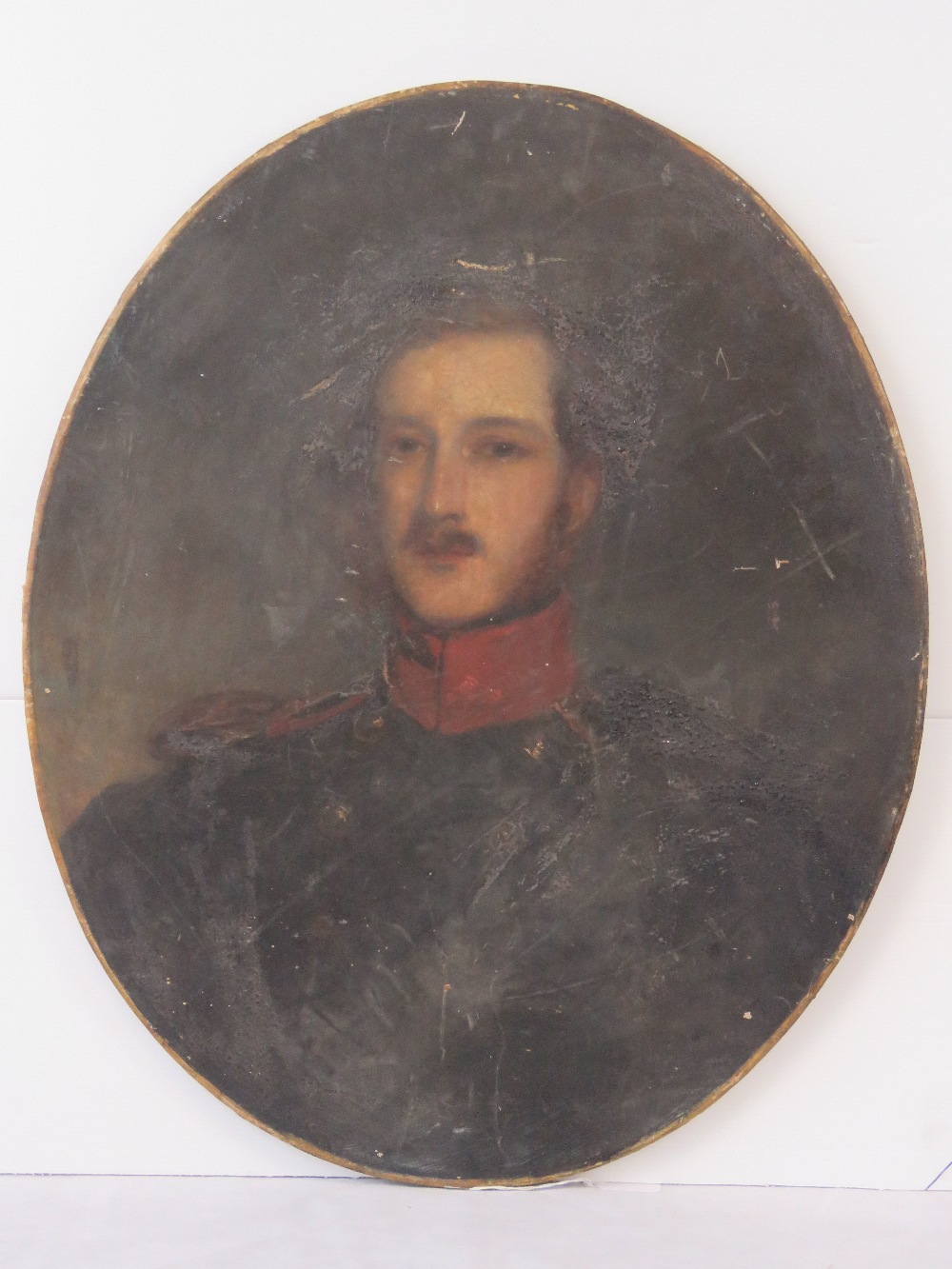 A mid 19th century oval portrait of a Eu