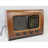 A retro Pye radio with wooden case with