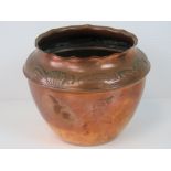 A delightful Art Nouveau copper pot with