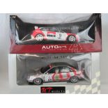 An Autoart die-cast model of a Toyota Corolla WRC together with an Audi A4 STW by UT models;