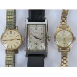 Three vintage watches; a ladies Longines on expanding bracelet,