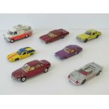 Seven retro die-cast metal Dinky toy cars: NSU RO 80; Police Ford Tranist van; Pontiac Parisienne;