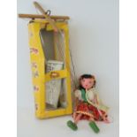 A vintage Pelham puppet of Gypsy girl, with original box and instructions (a/f).