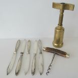 A vintage brass captive head corkscrew,