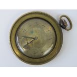 An unusual open face pocket watch with protective brass outer case (miners watch?),