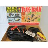 A Tri-ang Transogram "Dare Devil Trik-Trak" set, with two racing cars and most of track,