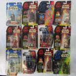 Twelve Star Wars action figures by Hasbro and Kenner from the 1990s including Luke Skywalker X-Wing;