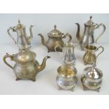 A silver plated tea service comprising two tea pots, two hot water pots,