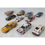 Nine die-cast metal (with some molded plastic) model racing cars and a model support vehicle,