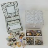 Two contemporary jewellery boxes containing a quantity of costume jewellery including necklaces,