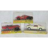 Three retro die-cast metal Dinky cars with original plastic presentation cases: 110 Aston Martin