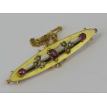 A delightful 9ct gold amethyst and seed pearl brooch, of oval form with central oval cut amethysts,