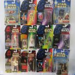 Twelve Star Wars action figures by Hasbro and Kenner from the 1990s including Boba Fett with sawed