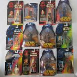 Twelve Star Wars action figures by Hasbro and Kenner from the 1990s including Grand Moff Tarkin;