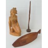 A well carved wooden figurine of a seated Oriental maiden together with a naive wooden carving of a