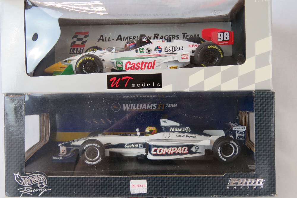 A Hotwheels Racing die-cast model of a Williams F1 team BMW with Castrol sponsorship together with