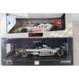 A Hotwheels Racing die-cast model of a Williams F1 team BMW with Castrol sponsorship together with