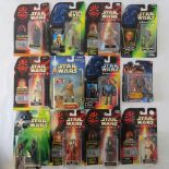 Twelve Star Wars action figures by Hasbro and Kenner from the 1990s including Yoda with "Commtalk