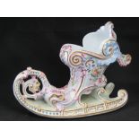 A delightful and unusual handpainted Victorian shaped and pierced ceramic table centrepiece in the