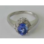 A delightful 18ct white gold Art Deco style tanzanite and diamond ring,