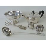 A quantity of good EPNS wares including teapot, presentation bowl, asparagus tongs, ladle,