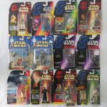 Twelve Star Wars action figures by Hasbro and Kenner from the 1990s including Luke Skywalker with