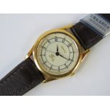 A ladies watch, strap and dial marked 'Burberrys', dial also marked Japan 2930-295223 KA.