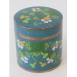 A turquoise ground cloisonné lidded pot standing 8cm high and 8cm diameter having floral decoration