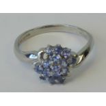 A platinum and tanzanite ring,