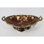 A Crown Devon Fieldings Rouge Royale twin handled and gilded bowl marked '5293' under.